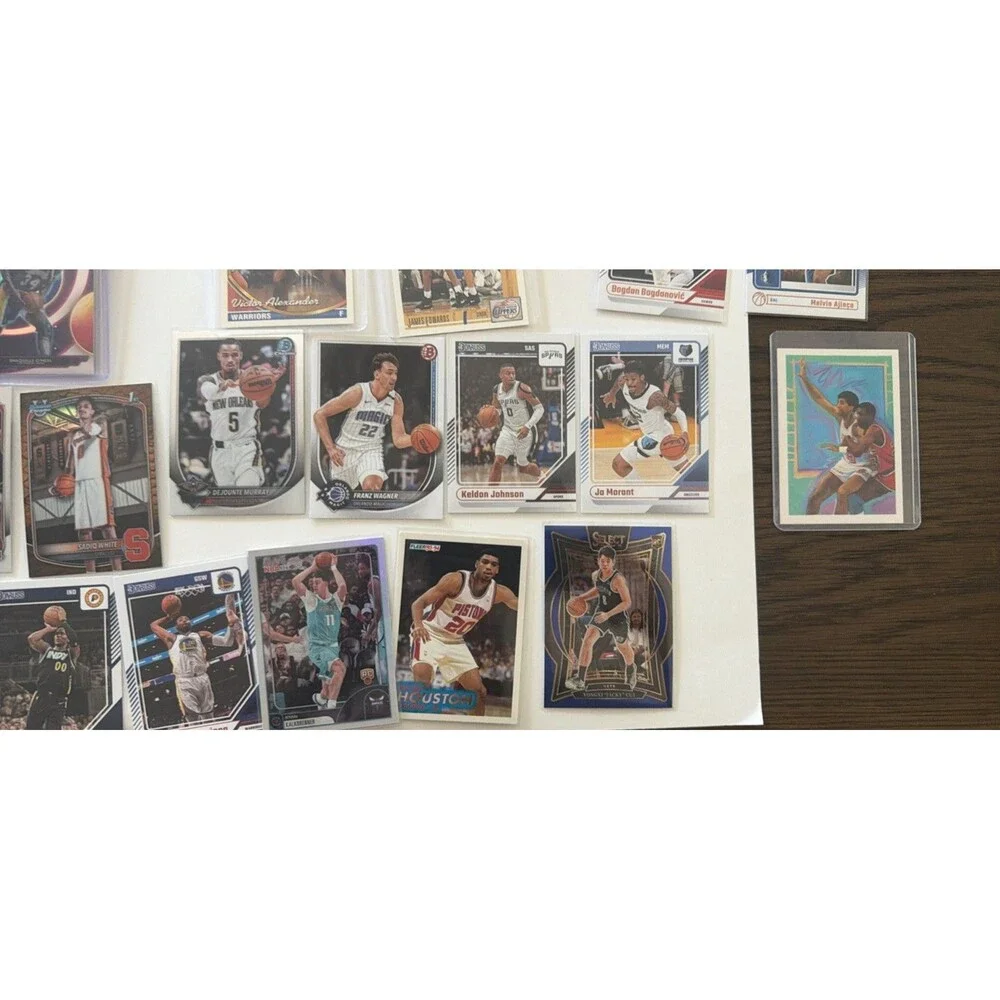 Panini 48-Card NBA 2023-24 Lot Hoops Rookies, MJ Bonus graded Luka and Tatum